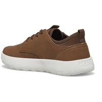 a brown sneaker with a white sole