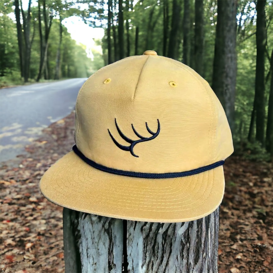 a hat that is sitting on top of a pole